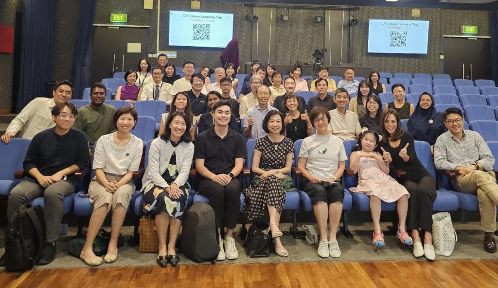 svg+xml;charset=utf Collective for a Stronger Society Stories and Resources DLT Group Photo