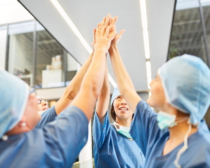 Nurses putting their hands together