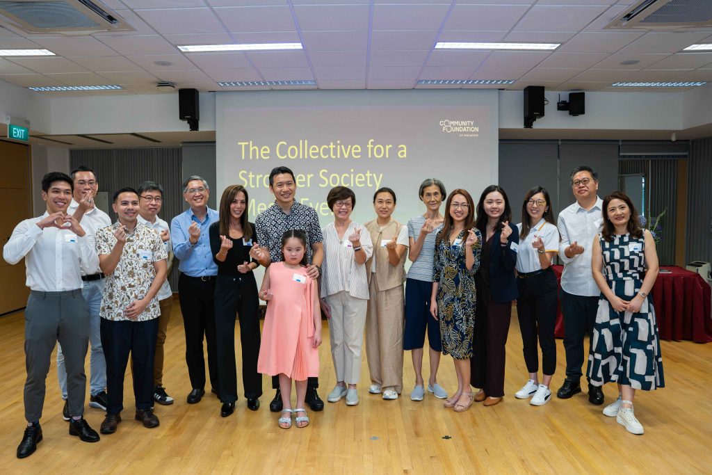 Guest-of-Honour, Mr David Neo (seventh from left), Acting Minister for Culture, Community and Youth & Senior Minister of State for Education together with Mrs Christine Ong (eighth from right), Chairman of the Community Foundation of Singapore (CFS) taking a group photo with donors.