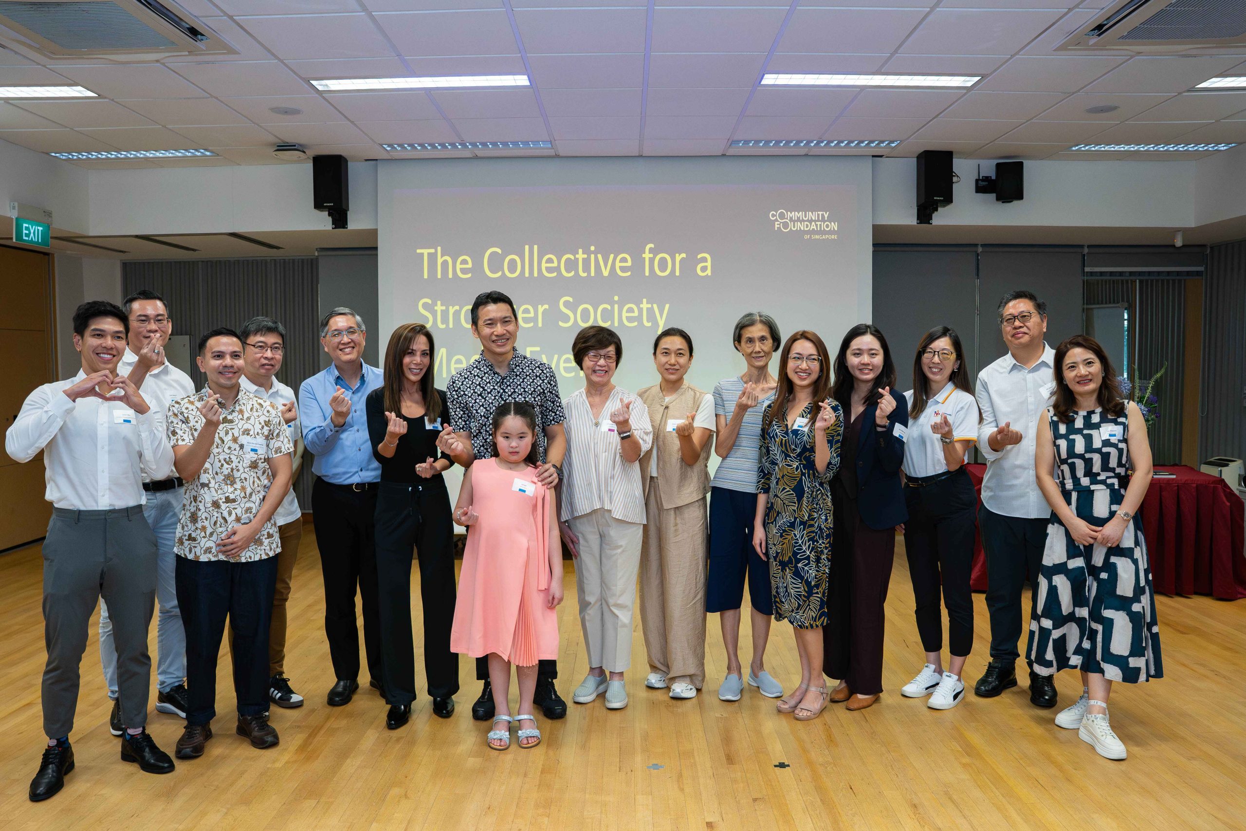 Guest-of-Honour, Mr David Neo (seventh from left), Acting Minister for Culture, Community and Youth & Senior Minister of State for Education together with Mrs Christine Ong (eighth from right), Chairman of the Community Foundation of Singapore (CFS) taking a group photo with donors.