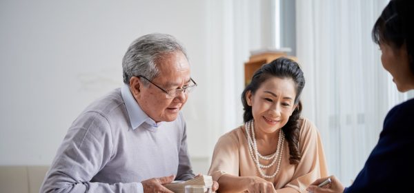 Senior-Couple-Buying-Real-Estate.jpg