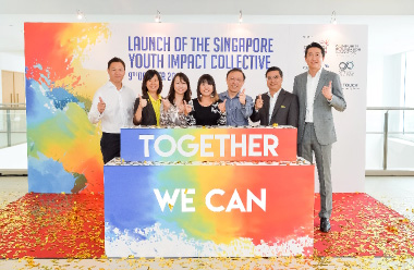 A group of people posing (From left) James Tan, Tan-Wu Mei Ling, Justina Tan, Joyce Teo, Dr Ang Kiam Wee, Pang Sze Khai and Jacky Ang