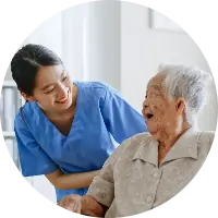 Caregiver supporting and elderly lady