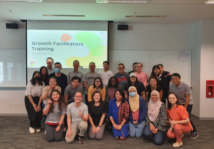 A group of people posing (Growth Facilitators Training)