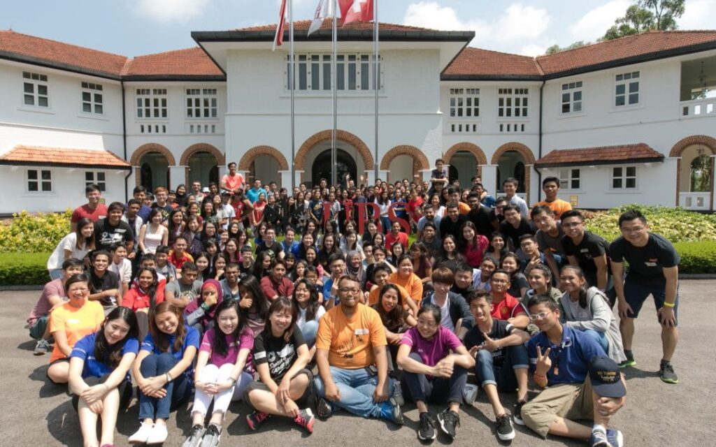 a group of youths posing for a photo