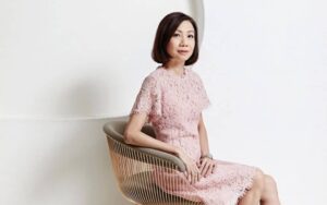 picture of CFS CEO Catherine Loh sitting on a chair