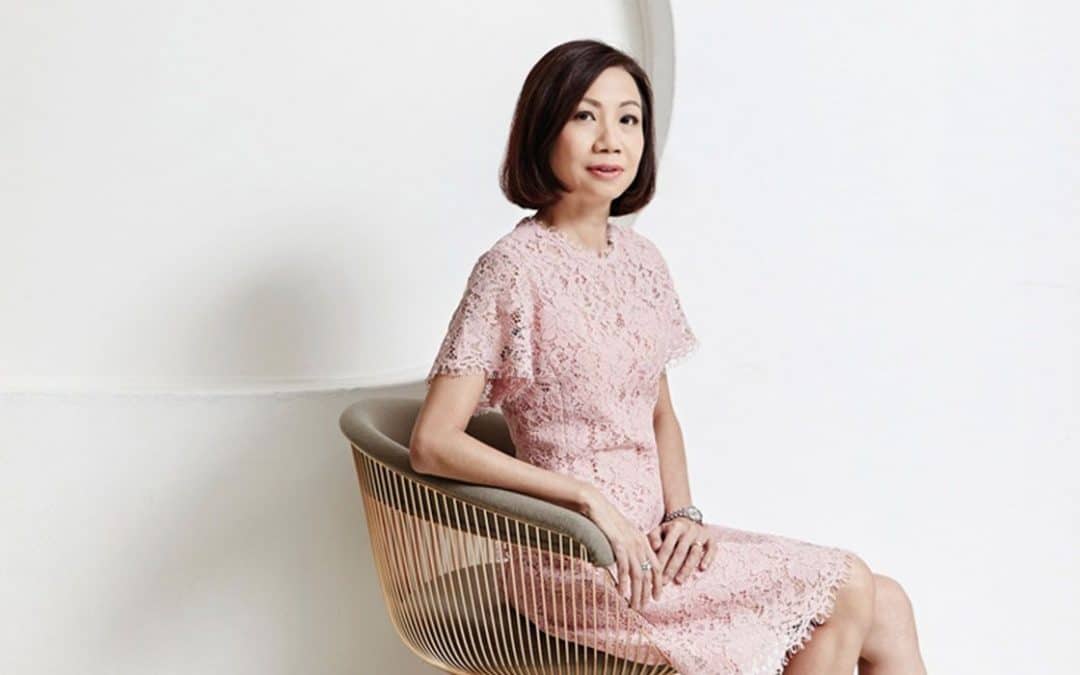 picture of CFS CEO Catherine Loh sitting on a chair